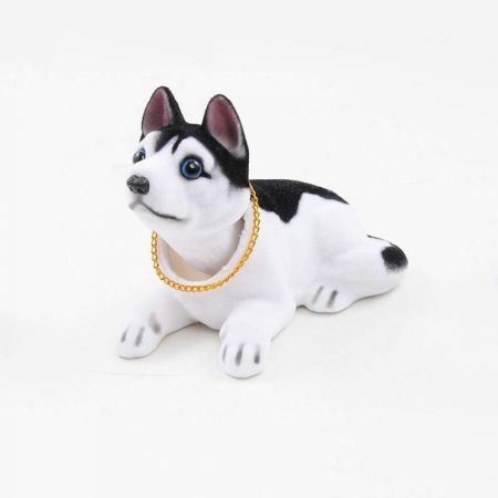 Chó lắc lư trên ô tô